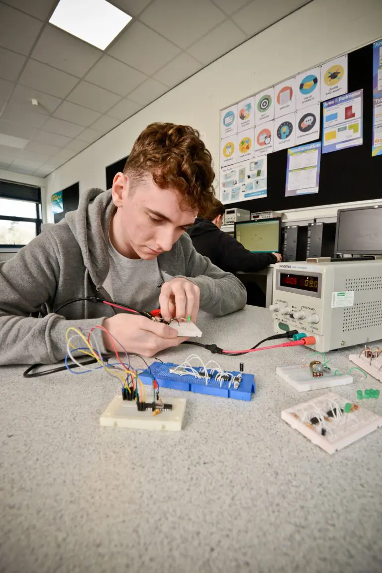 Student working on electrical circuits